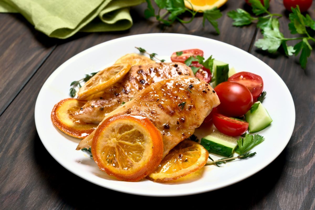 Chicken,Breast,With,Orange,Sauce,And,Vegetable,Salad.,Dish,For